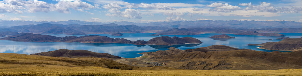 西藏山南：羊湖美景引客来