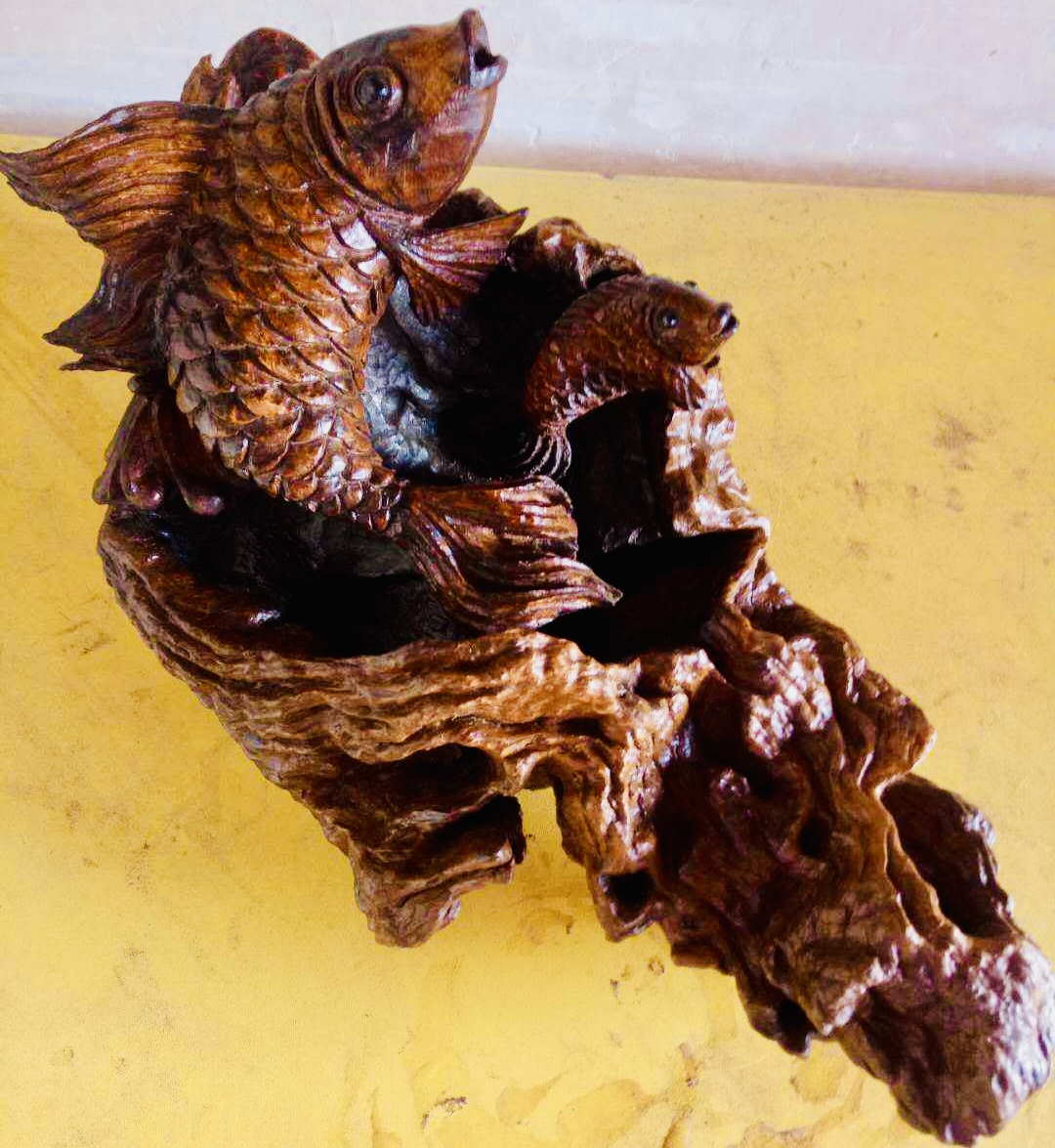 他用20年，把枯根变成“会说话”的传家宝