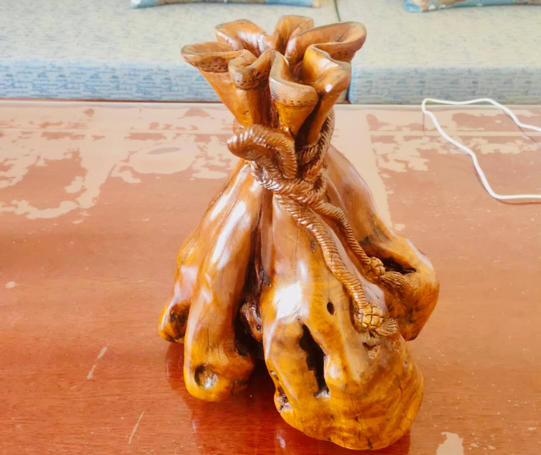 他用20年，把枯根变成“会说话”的传家宝